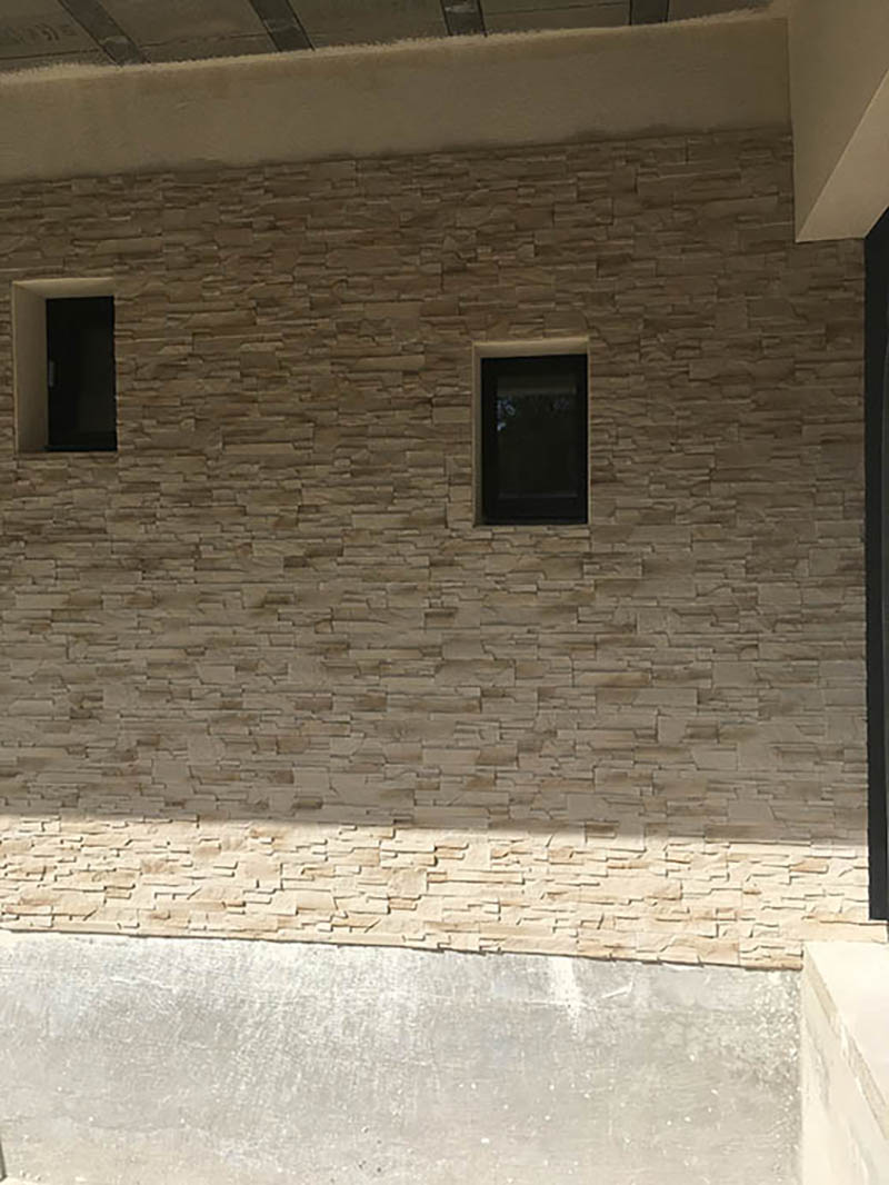 Pose d’enduit de façade, La Rivière-de-Corps